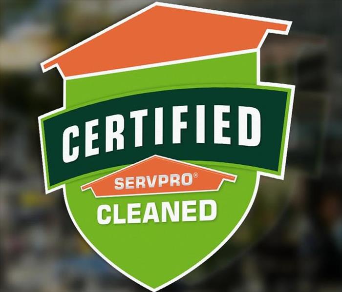 Green and Orange Certified: SERVPRO Cleaned Sign